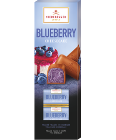 Цукерки шоколадні з начинкою Чорничний Чизкейк в молочному шоколаді Niederegger 100 г