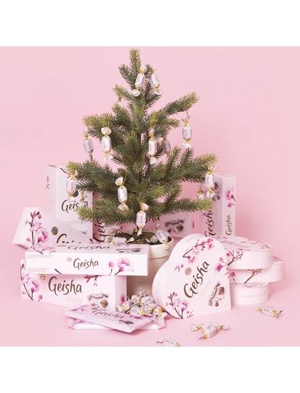 Цукерки шоколадні з горіховою начинкою в молочному шоколаді Fazer Geisha 150 г, зображення 2